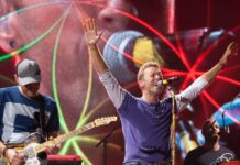 Coldplay is Making New Music Under a Different Name Chris Martin in concert with Coldplay in 2017
