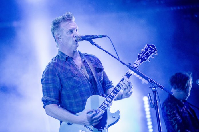 Josh Homme performs with Queens Of The Stone Age