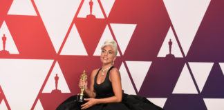 Lady Gaga with her Oscar award for best original song