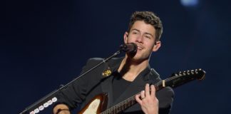 Nick Jonas in concert with Jonas Brothers in 2020