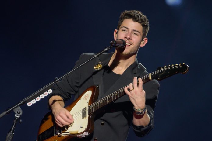 Nick Jonas in concert with Jonas Brothers in 2020