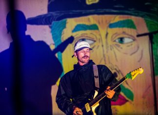 John Gourley in concert with Portugal. The Man in 2018.