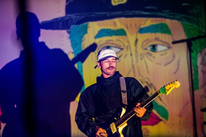 John Gourley in concert with Portugal. The Man in 2018.