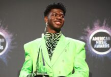 Lil Nas X Reveals Collab With Lizzo is “Definitely Going to Happen” Lil Nas X at the American Music Awards in 2019