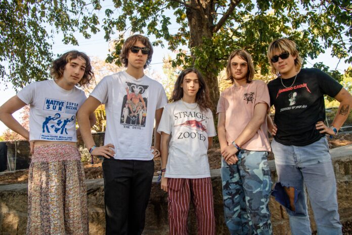 Foster Hudson, from left, Cameron Winter, Dominic DiGesu, Gus Green and Max Bassin of Geese pose for a photo backstage on day two of Shaky Knees Music Festival in October 2021.