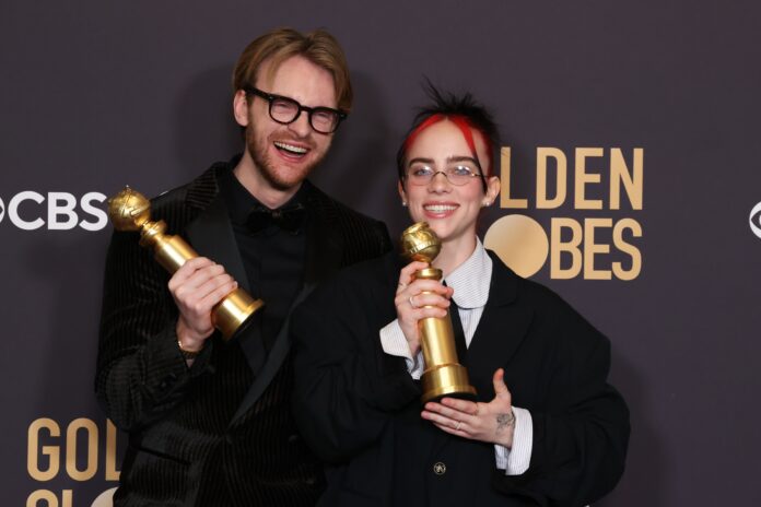 Billie Eilish and Finneas with the Golden Globe for Best Original Song, Motion Picture, 
