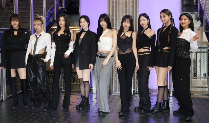 Jeongyeon, Chaeyoung, Sana, Dahyun, Momo, Mina, Tzuyu, and Jihyo attend as TWICE Musicians on Call Light the Empire State Building to Celebrate the Healing Power of Music at the Empire State Building in New York in Mach 2023